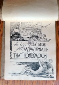 pen and ink drawn title page showing mermaids pulling boat
