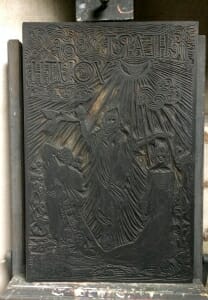Large black woodcut block depicting three figures standing in rays of sunlight. The words the heart of youth are carved along the top.