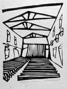 Black and white woodcut print using bold, expressionist lines to depict theater interior, seats, stage.