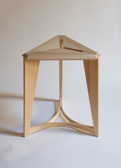 light wood triangular stool
