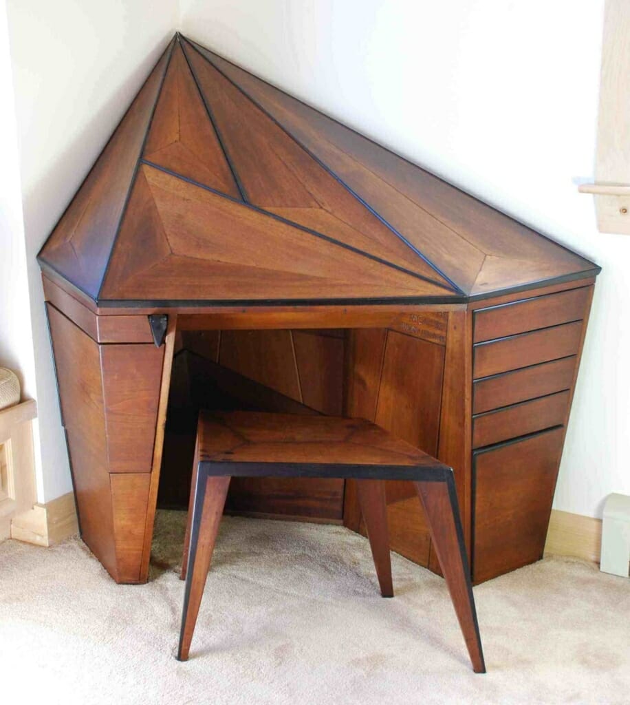prismatic or faceted diamond shaped wooden corner desk with matching stool