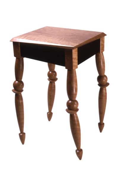 table with legs that appear jointed or precariously stacked, and a top that has askew angles