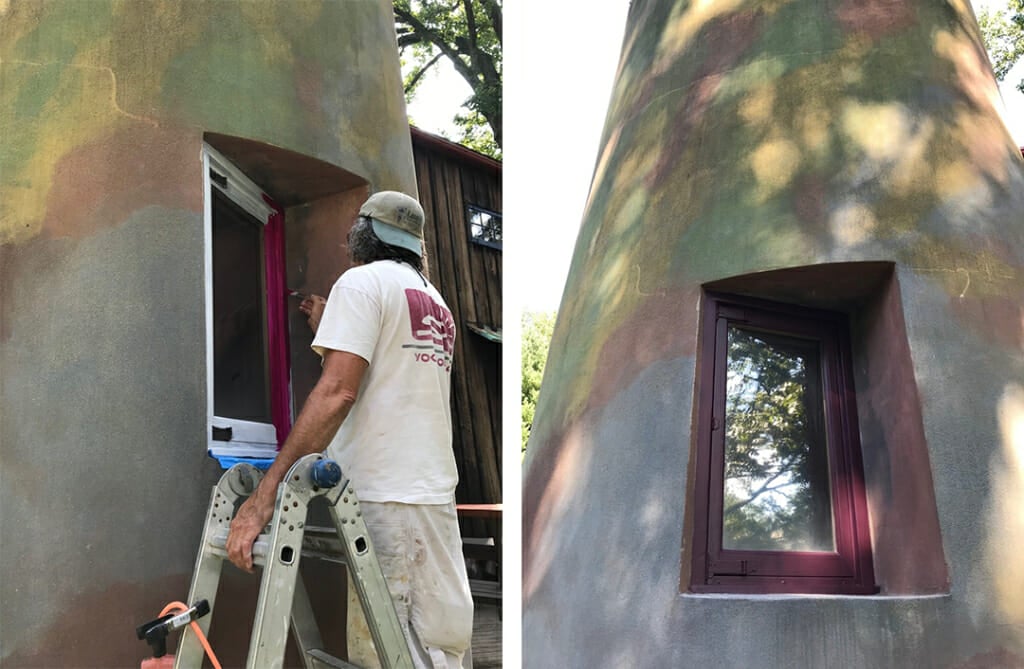 left image shows man in white t-shirt on a ladder painting a window frame. Right image shows the finish window with a plum colored frame. The window is deeply set into a concrete and stucco wall with mottled blue, green, brown, and yellow colors and dappled in afternoon light.