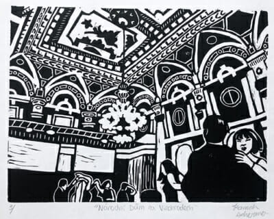 black and white woodcut print depicts a beautiful and ornate ballroom ceiling. Out view is towards the ceiling with just the upper bodies of the dancers visable at the bottom of the page.