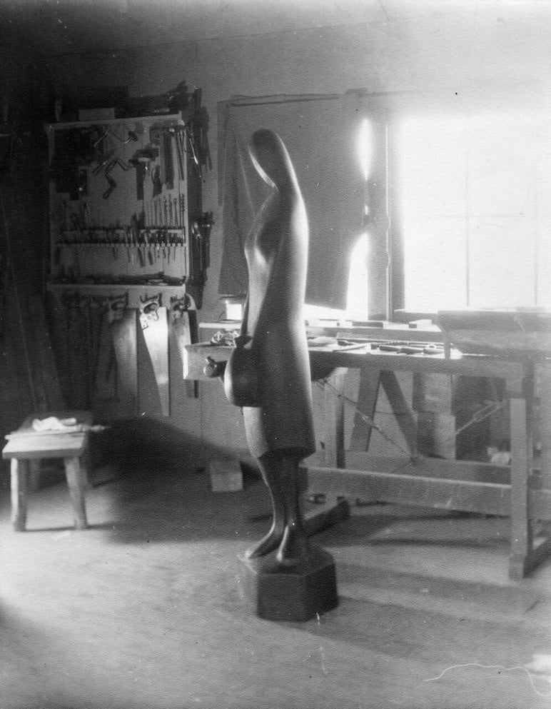 Black and white photograph of inside Esherick's studio with a sculpture of a woman