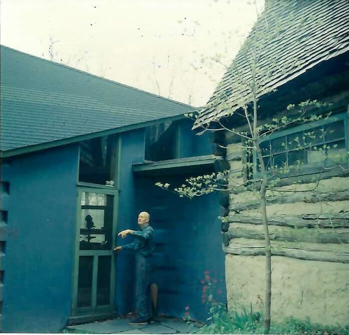 Color photo of Wharton Esherick outside the blue Workshop