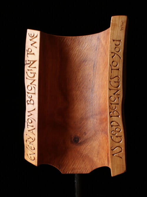 Wooden sculpture by David Fisher depicting words by Walt Whitman