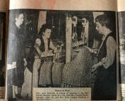 Photograph of newspaper featuring photograph of Letty teaching weaving