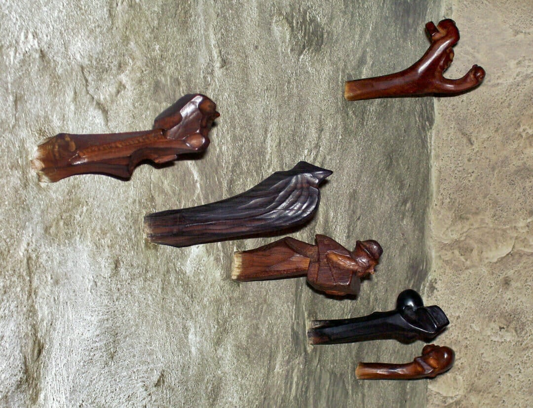 Carved coat pegs of the people who helped Esherick build his studio